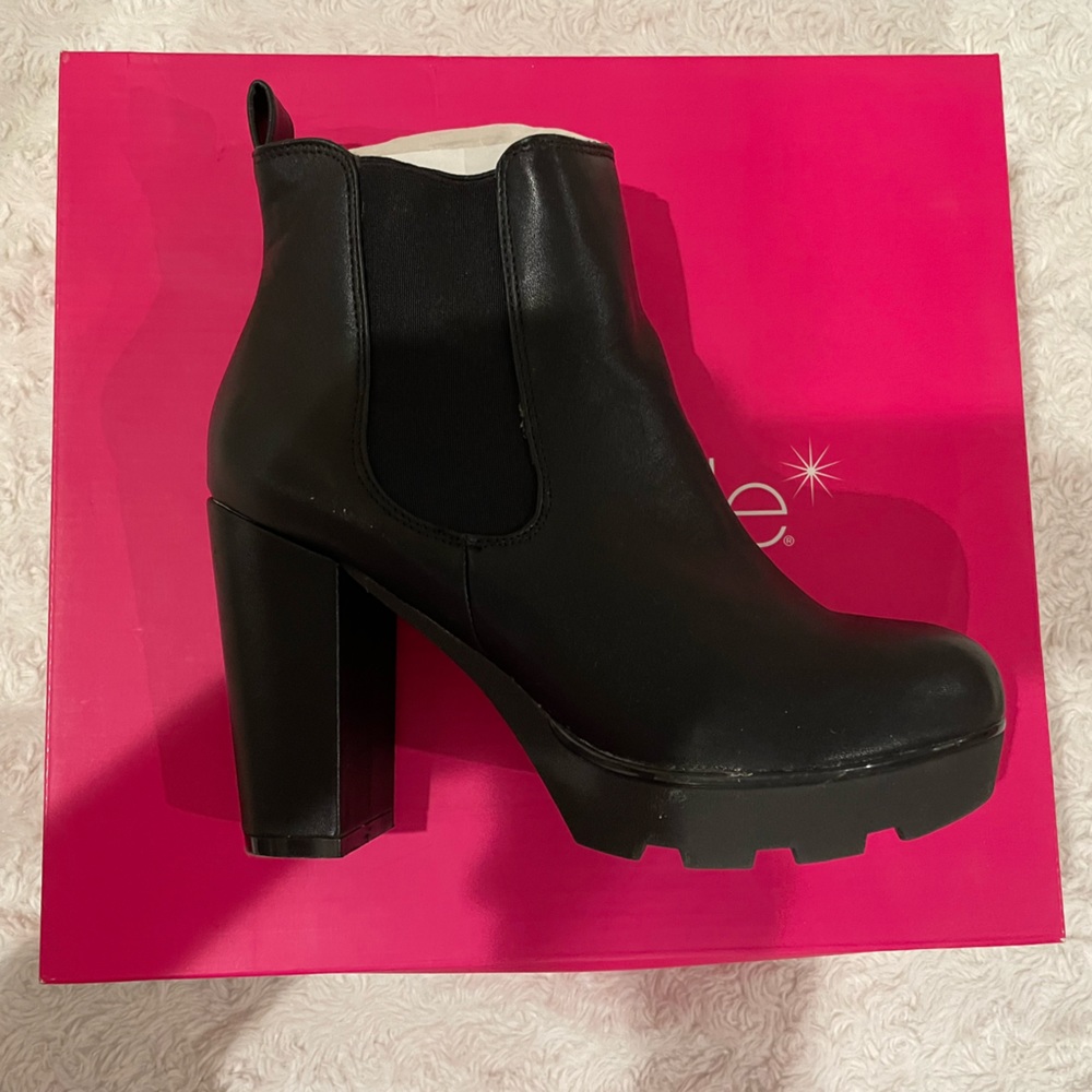 Black faux leather bootie. Shoe Dazzle